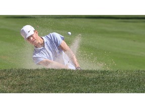 In this file photo Steven Hill, who is set to join the St. Clair Saints next season, blasts out of a sand trap at Roseland Golf Club.
