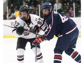 LaSalle Vipers' captain Owen Findlay (44) at right, battles Chatham Maroons' Colton Henderson (97) during quarter-final play in the Western Conference of the Greater Ontario Junior Hockey League.