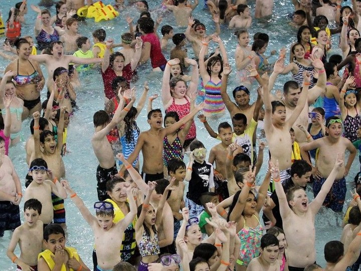  The Windsor International Aquatics and Training Centre and Adventure Bay are usually not this busy — but on June 18, 2015, students from a number of local schools hit the water as part of a world record attempt for the Largest Global Swimming Lesson.