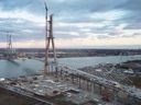 The Canadian tower leg of the Gordie Howe International Bridge features prominently in this aerial photo from the Windsor side on Thursday, Feb. 29, 2024.
