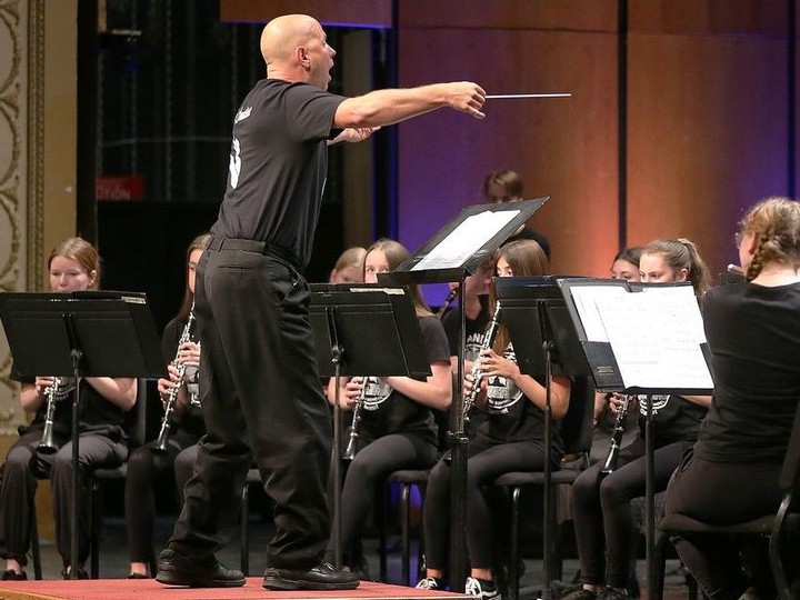  North Star High School conductor Randy Lefrancois and his students perform at a MusicFest Windsor event at the Capitol Theatre in Windsor on Tuesday, March 26, 2024.