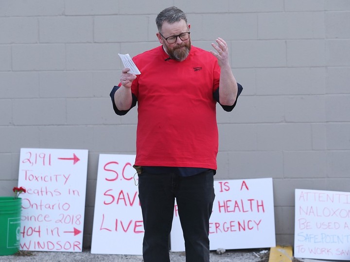  Rev. Rielly McLaren speaks at a vigil on Thursday, March 28, 2024, outside the shuttered SafePoint Consumption and Treatment Service site in downtown Windsor.