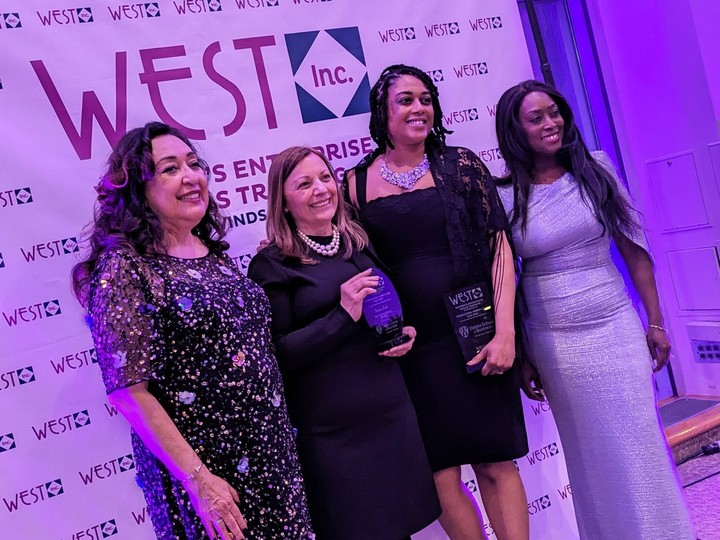  Joyce Zuk (centre left) poses for a photo with Rose Anguiano Hurst (left), Kemi Anazodo (centre right), and Nadine Manroe-Wakerellafter receiving the Sisterhood Award during the WEST of Windsor Inc. International Women’s Day Gala at the St. Clair College Centre for the Arts on Friday, March 8, 2024.