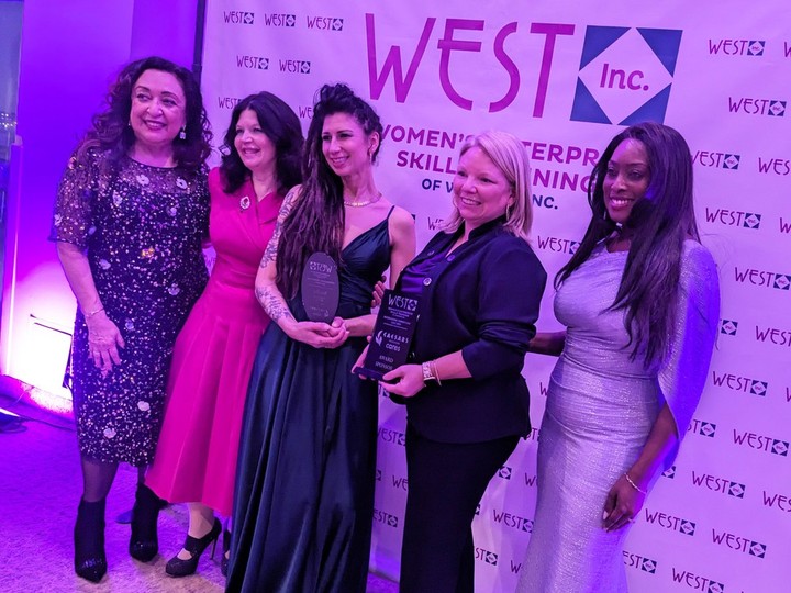 Kate Isley (centre) poses for a photo with Rose Anguiano Hurst (left), Pati France (centre left), Kelly Wolfe Gregoire (centre right) and Nadine Manroe-Wakerell after receiving the Influencer Award during the WEST of Windsor Inc. International Women’s Day Gala at the St. Clair College Centre for the Arts on Friday, March 8, 2024.