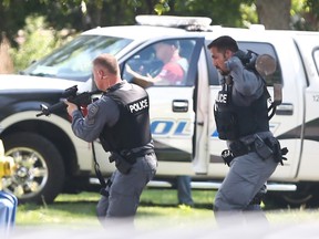 Officers with weapons
