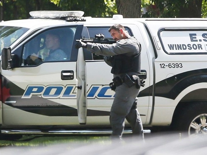  Weapons drawn, members of the Windsor Police Service’s emergency services unit were among officers surrounding a home on Betts Avenue in Windsor on Sept. 15, 2017.