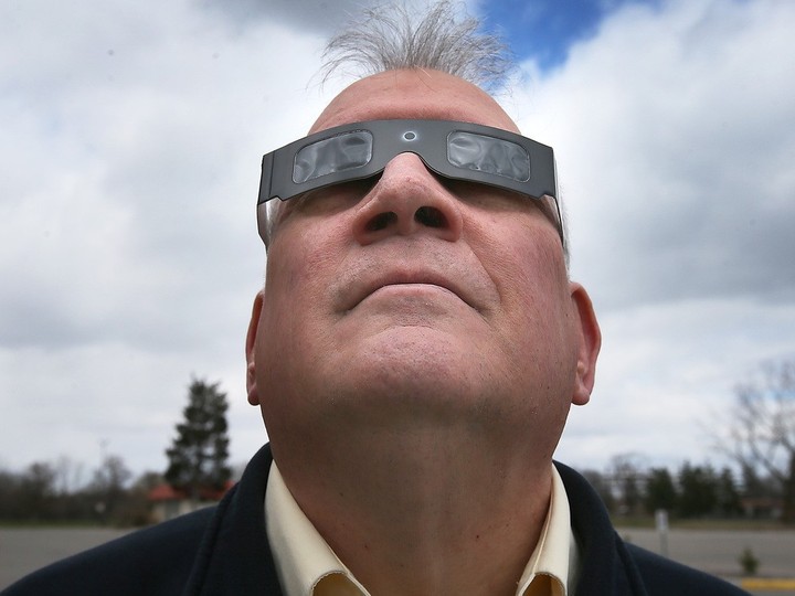  Preparing for April 8 sky magic: Steven Pellarin, a University of Windsor astronomy teacher and vice-president of the Royal Astronomical Society of Canada, displays a pair of solar eclipse glasses on Wednesday, March 20, 2024.