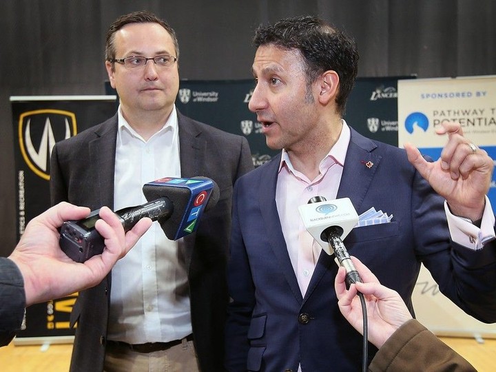  As fellow Liberal MP Irek Kusmierczyk looks on, Minister of Justice and Attorney General of Canada Arif Virani reveals upcoming federal budget details on new child care spending during a gathering with reporters on Thursday, March 28, 2024 at the University of Windsor.