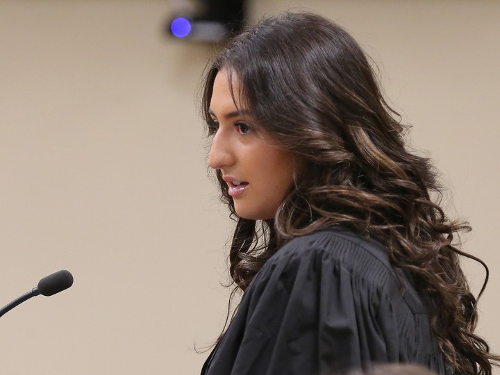  A student dressed in legal robes addresses the court during a Superior Court of Justice mock trial organized Monday by the Ontario Justice Education Network.