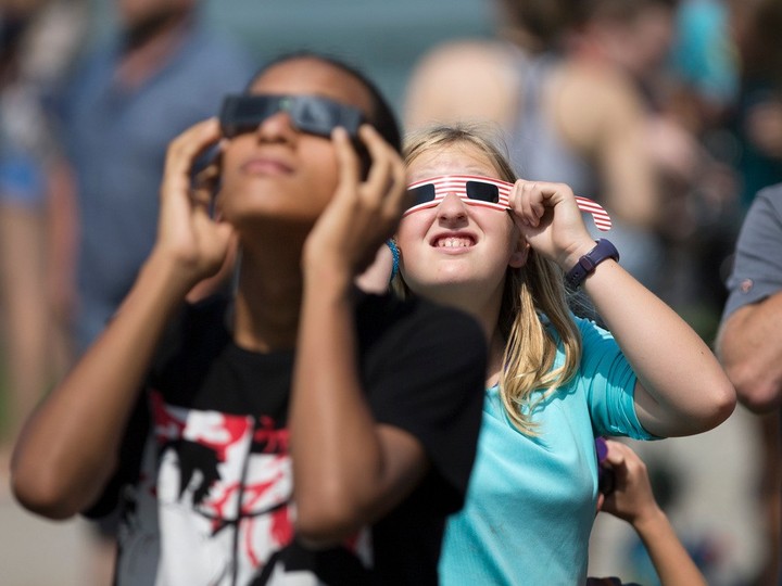  Protective glasses are a must when watching a solar eclipse. Crowds flocked to Windsor’s waterfront during the partial solar eclipse of Aug. 21, 2017.