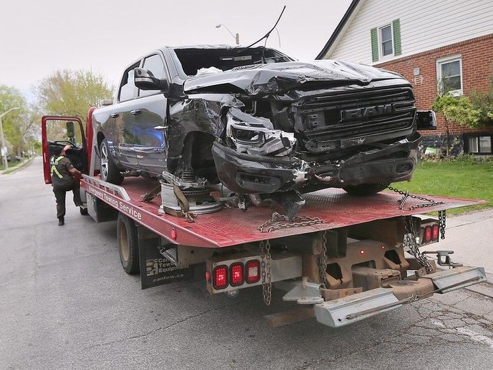  A truck sits on a tow truck on Tuesday, April 23, 2024, after a collision involving five vehicles on Bruce Avenue in Windsor.