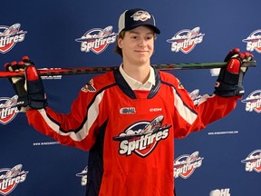 Defenceman Carter Hicks, who was a second-round pick by the Windsor Spitfires in the Ontario Hockey League Draft, has officially signed on with the team.
