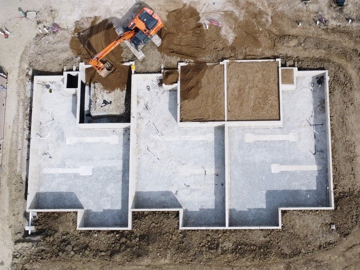  An aerial view of the foundation of a multi-unit townhouse development under construction on Barkley Avenue in Windsor on Wednesday, April 10, 2024.