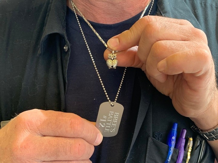  Mark Van Watteghem shows his Bree’s Battle tag and an owl pendant containing the ashes of his daughter Breanna, on March 28, 2024.
