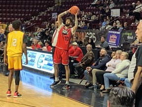 Windsor Express forward Ty Groce (10) looks to inbound the ball against Newfoundland Rogues' guard Omega Harris during Thursday''s Basketball Super League game at the WFCU Centre in Windsor.