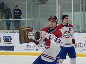 Four days after winning the Bill Stobbs Division, Kyle Walker, seen lifting the trophy, and the Lakeshore Canadiens open quarter-final play on Thursday against the Thamesford Trojans.