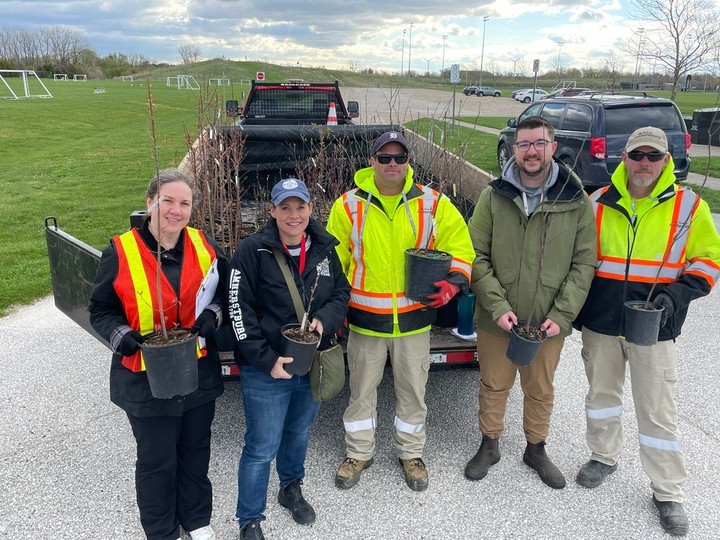  Alice Grgicak-Mannion, left, Heidi Baillargeon, Jeremy Pillon, Brian Kountourotiannis and Dan Hutnik were handing out trees for an Earth Day planting event in Amherstburg on Saturday. A map-and-grow project will see the town geo-locate the trees and monitor the future growth of the town’s canopy.