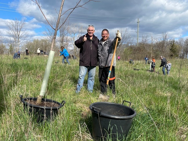  Amherstburg Mayor Michael Prue (left) and deputy mayor Chris Gibb are shown during an Earth Day tree planting event near the Libro trails in Amherstburg on Saturday, April 20, 2024.