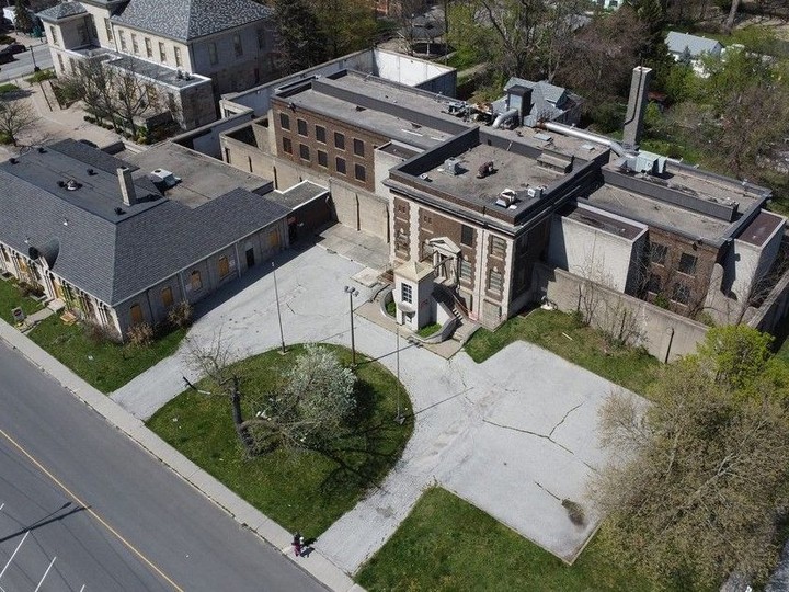  The former Windsor Jail property on Brock Street is shown from above on Monday, April 22, 2024. The registry building is in the left foreground. Mackenzie Hall is in the photo’s top left, with the city-leased parking lot between the two historic buildings.