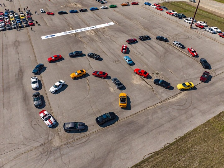  The first drivers to show up with their iconic muscle cars at the Mustang 60th anniversary gathering in Windsor assembled in the shape of the number 60 outside the factory that continues to build the most powerful Mustang engines.