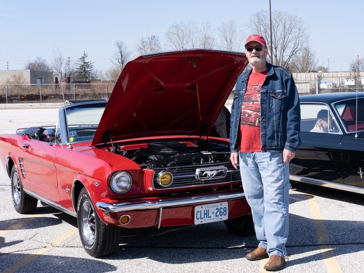  Gary Barash, a retired 30-year Ford Motor Company employee, shows off his 1966 Mustang convertible 3-speed during Sunday’s 60th anniversary celebration in Windsor.
