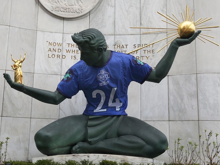  The Spirit of Detroit statue is shown with an NFL Draft jersey in downtown Detroit on Wednesday.