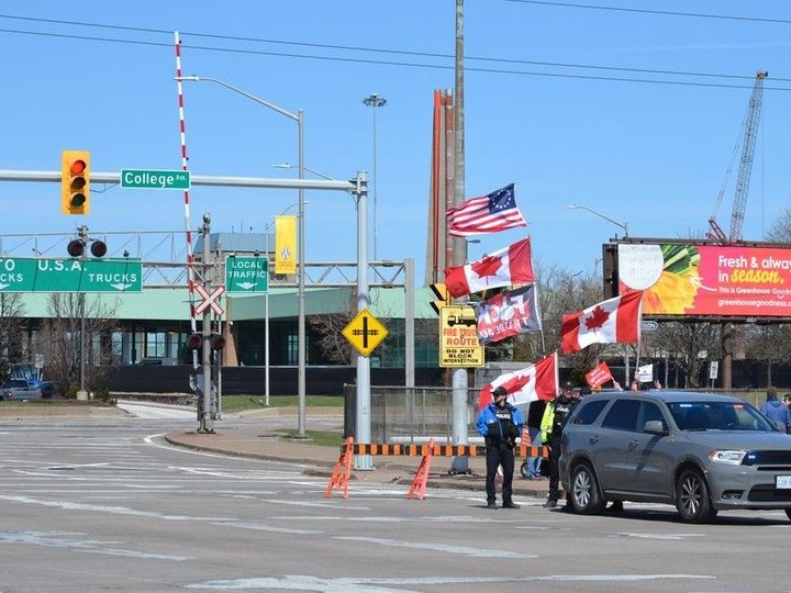  Police barricade streets around the Ambassador Bridge on Monday, April 1, 2024, as protesters assemble nearby.