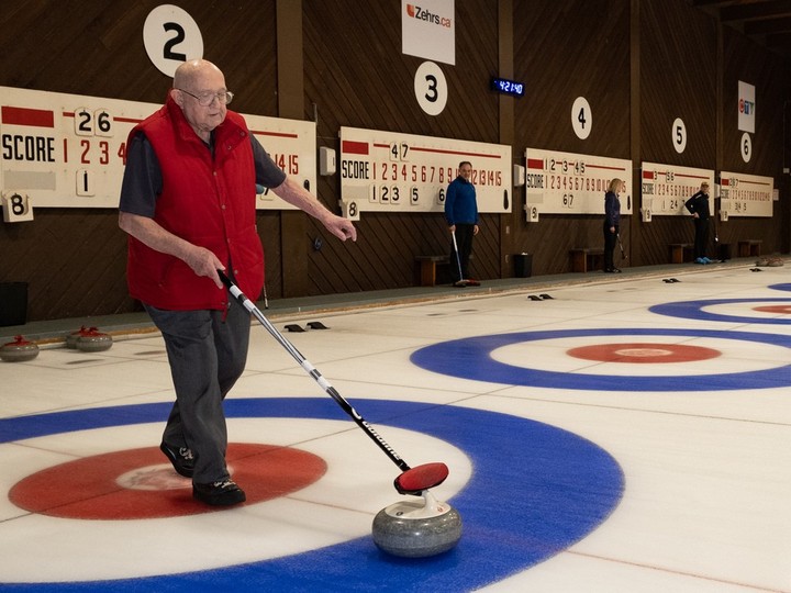  Roseland’s ceremonial last rock is thrown by longtime member James King at Roseland Golf and Curling Club on Saturday, April 13, 2024. Fellow longtime member Bobby Cunningham also threw a simultaneous last rock on the other side of the rink.