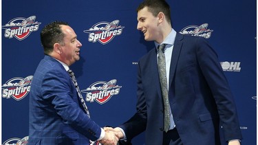 It took time for Windsor Spitfires' general manager Bill Bowler, left, to convince first overall pick Ethan Belchetz, at right, and his family to join the club.