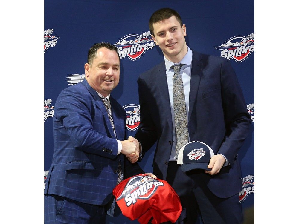 Windsor Spitfires' general manager Bill Bowler, left, made Ethan Belchetz just the second player taken first overall in the club's history and the first since 1976.