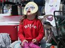 A Windsor girl occupied a solar eclipse on the beach in Leamington on April 8, 2024.