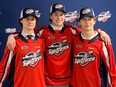 Windsor Spitfires' third-round pick Andrew Robinson, at left, is joined by second-round picks Carter Hicks, centre, and J.C. Lemieux, at right, as the trio arrived at the WFCU Centre on Saturday after being selected in the Ontario Hockey League Draft. (WINDSOR STAR - JIM PARKER)