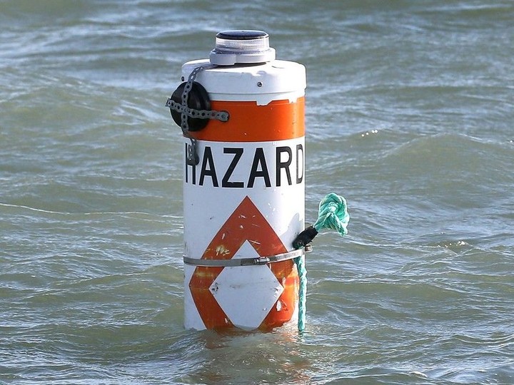  A high-tech monitoring buoy is shown bobbing in the water in Lake Erie near Leamington on Tuesday.
