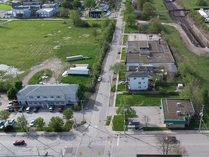  The future H4 hub at 700 Wellington Ave. is shown Tuesday on the left. In the foreground is the intersection of Wellington and Wyandotte Street West.
