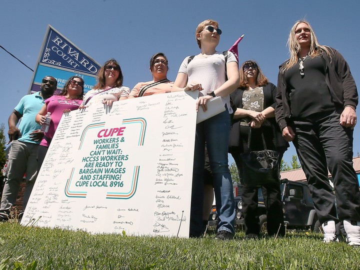  Local home and community health care workers protest outside the Tecumseh Road East office of MPP Andrew Dowie (PC — Windsor-Tecumseh) in Windsor on Wednesday, May 8, 2024.