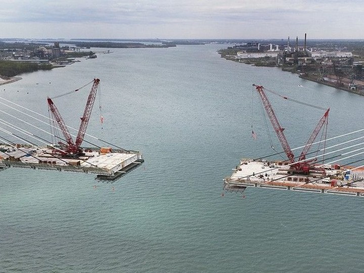  The narrowing gap between the two spans of the Gordie Howe International Bridge over the Detroit River — looking south with Windsor on the left — is shown on May 1, 2024. DAN JANISSE/Windsor Star