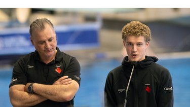 Canadian Olympic diver Rylan Weins, at right, and Diving Canada chief technical officer Mitch Geller talk about this weekend's Canadian Diving Trials at the Windsor International Aquatic and Training Centre on Wednesday.