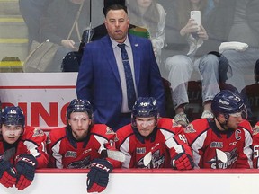 Former Windsor Spitfires' head coach Marc Savard and the Calgary Flames mutually parted ways on Wednesday, but do not expect him back in town to fill the club's vacant head coaching post.