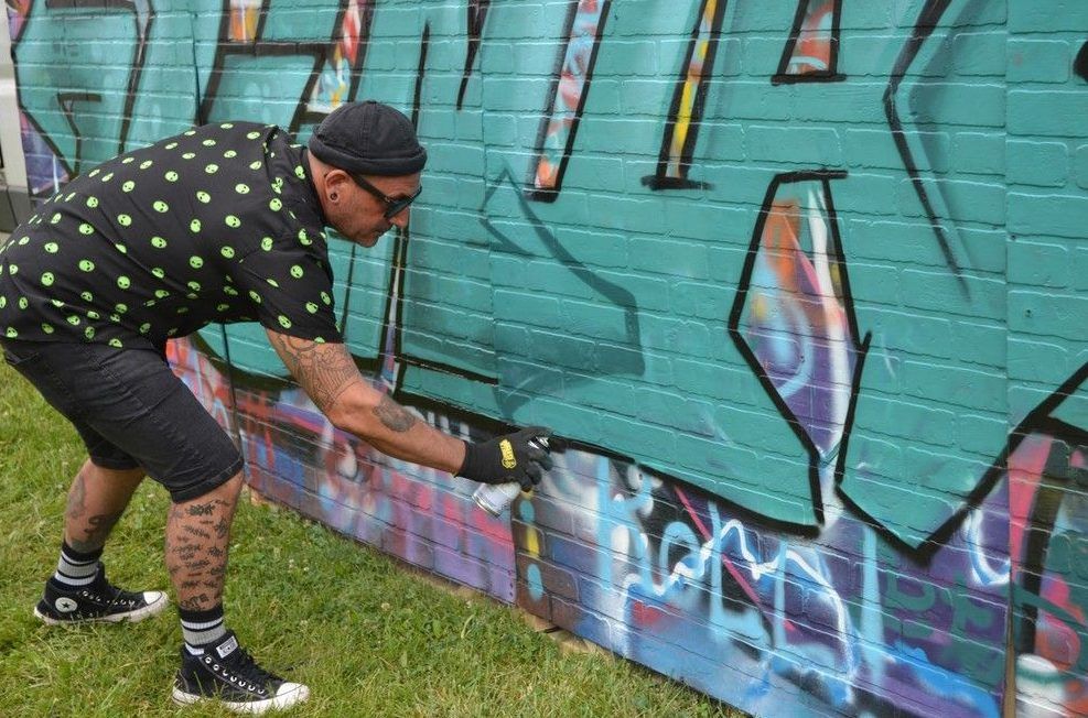 Artist Daniel Bombardier from Enjoy Denial does live painting on his Whateverland display at  Art in the Park, Sunday, June 2, 2024. Rotary Club of Windsor (1918) runs the annual event, which was started in 1970 by the Art Gallery of Windsor.