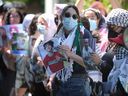 Pro-Palestinian demonstrators protest outside the University of Windsor's Toldo Building on Friday, May 31, 2024.