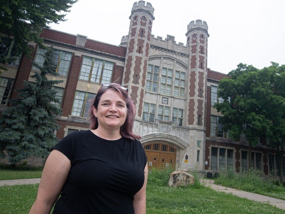 Looking for partners. Fiona Coughlin, executive director and CEO of Habitat for Humanity Windsor-Essex, stands outside the former W.D. Lowe High School building in Windsor on Tuesday, June 18, 2024. It's just one of the municipally owned properties where city council wants private developers to build housing.