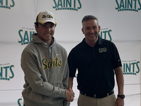 St. Clair Saints' golf coach Kevin Corriveau, at right, welcomes recruit Cale Marontate, who is a past WECSSAA champion and will join the squad for the 2024-25 season.
