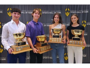 Hadre Cup winners, from left, Sandwich's Alexander Ioanidis, and Kingsville's Hayden Nurse along with Repko Cup winners Sian Kniaziew, of Cardinal Carte,r and Nicole Seagris, of Sandwich, pose after being presented the award at the Ciociaro Club.