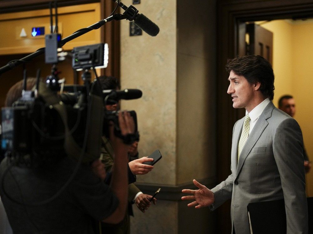 Politics tamfitronics Prime Minister Justin Trudeau speaks to reporters in the foyer of the House of Commons on Parliament Hill in Ottawa on May 28, 2024.