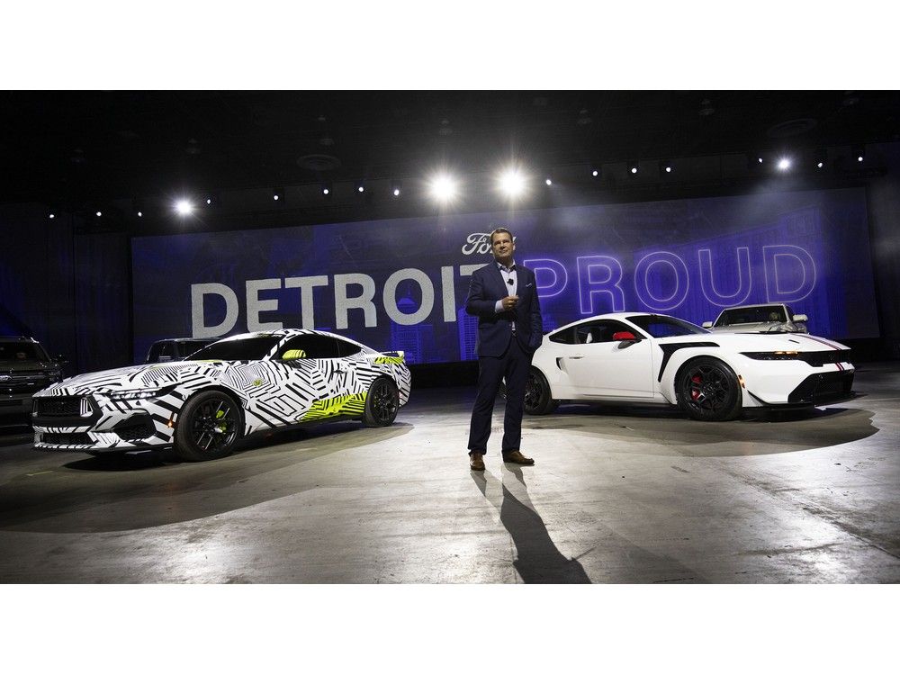 'Already talked to President Trump.' Ford Motor Company president and CEO Jim Farley stands between the Ford Mustang RTX (left) and the Ford Mustang GTD at a Ford 