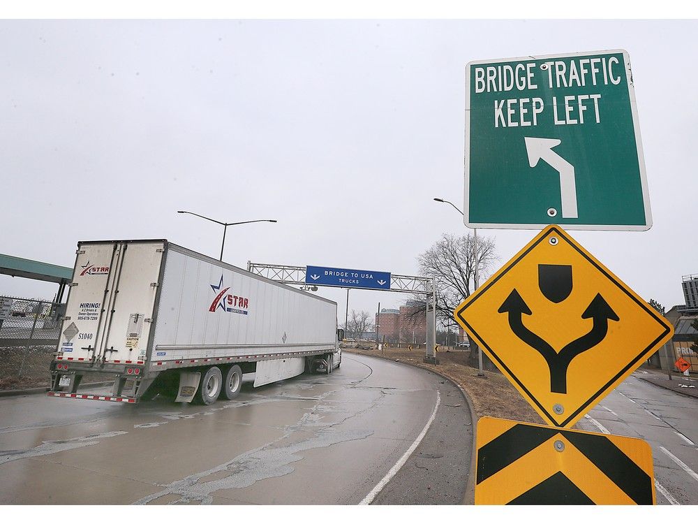 WINDSOR, ONT. : FEBRUARY 3, 2025 --  A truck heads to the Ambassador Bridge from Windsor on Monday, February 3, 2025.