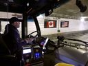 Transit Windsor bus driver Cliff Pryszlak drives through the Detroit-Windsor Tunnel on Saturday, Feb. 8, 2025 carrying hockey fans to the Little Caesars Arena in Detroit.