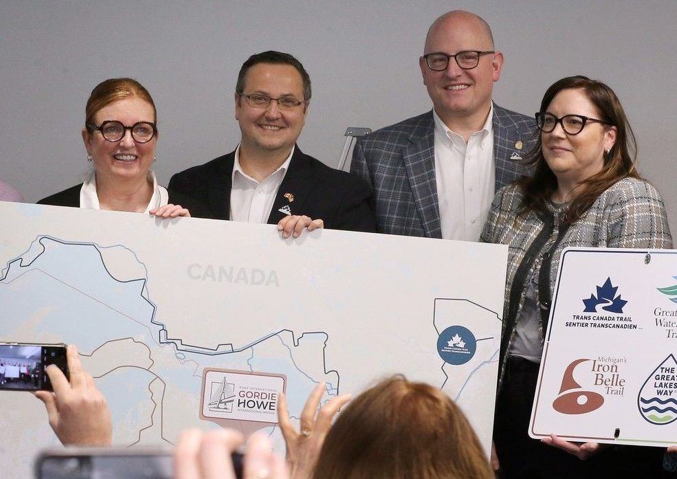  eleanor mcmahon, then-head of trans canada trail, windsor-tecumseh mp irek kusmierczyk, windsor mayor drew dilkens and heather grondin of the windsor-detroit bridge authority, are shown feb. 9, 2024, at windsor city hall during an announcement that the gordie howe international bridge will join the trans canada trail and become the first international bridge border crossing within the 28,000-km trail network.