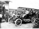 In this historic photo taken in 1911 at the large suitcase station in Windsor, Gordon McGregor, head of Ford Motor Canada, was placed behind the steering wheel of a lively new Ford model. Sitting next to him was WC Kennedy, then president of Windsor Gas Company. From 1896 to 1911, Canadian Prime Minister Sir Wilfred Laurier was directly in the rear seats. To his right is George P. Graham (George P.