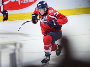 Windsor Spitfires defensive player Conor Walton celebrated his first professional playoff game in a win over the Kitchener Rangers at the WFCU Center on Saturday.